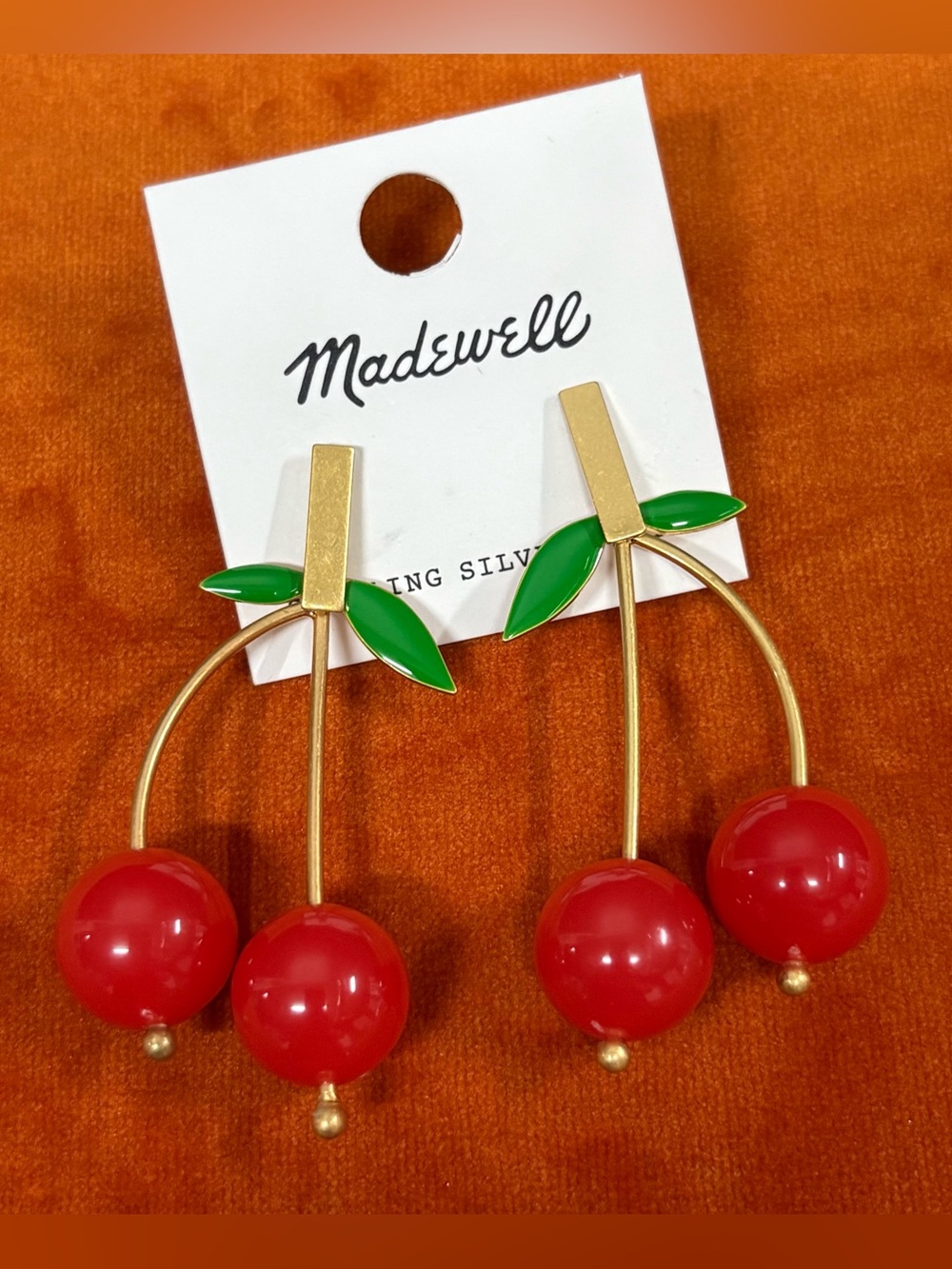 Madewell NWT red cherry earrings. Gold stems, green enamel leaves,